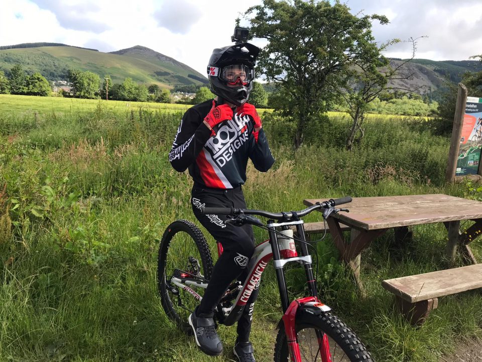 Ryan Branner, a mountain bike coaching client, riding his bike.